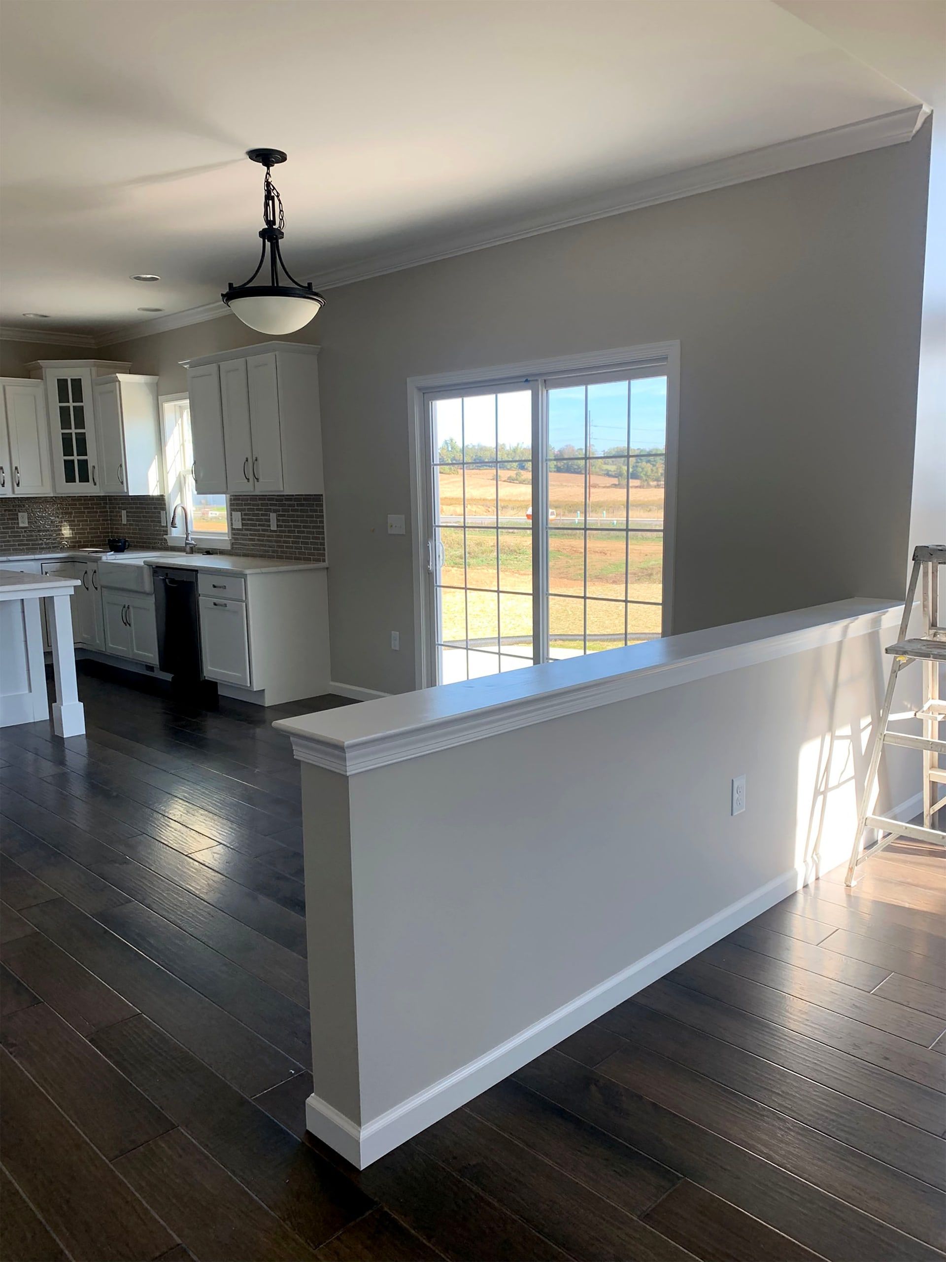 Kitchen with freshly painted white cabinets