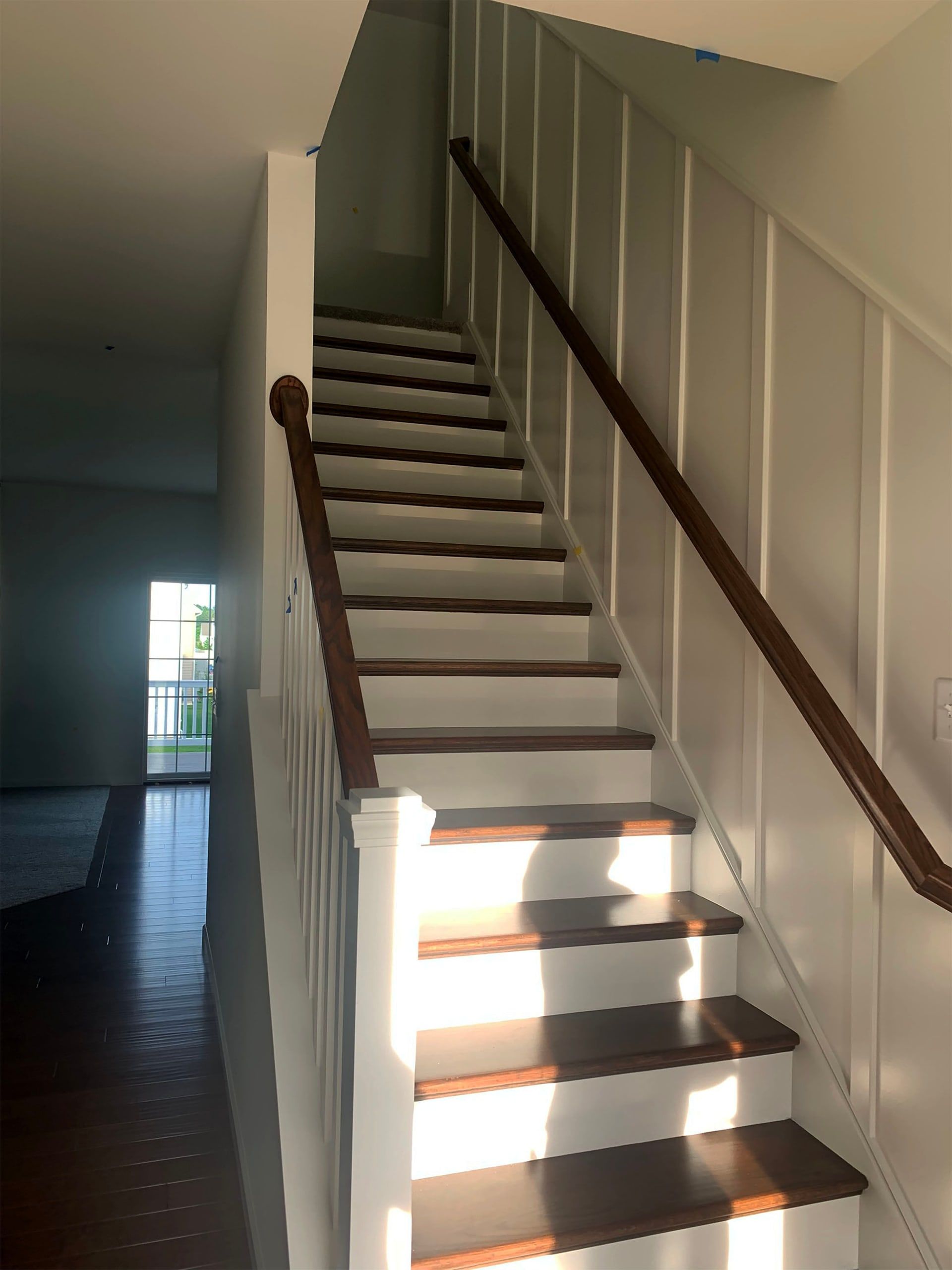 Stained Handrails, Stained Steps, Gloss Panel Wall, Gloss Kickers, Varnished Handrails and Steps